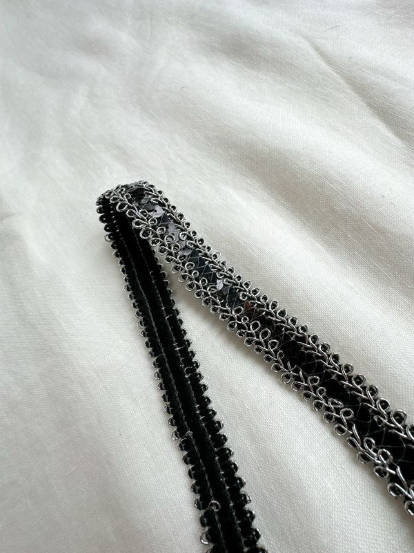 Black sequin embroidered trim with silver edge
