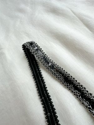 Black sequin embroidered trim with silver edge