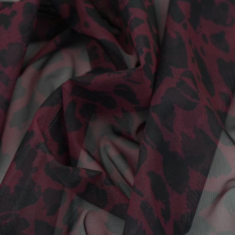 Printed stretch mesh with a pattern