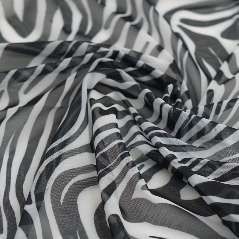 Printed stretch mesh with a pattern