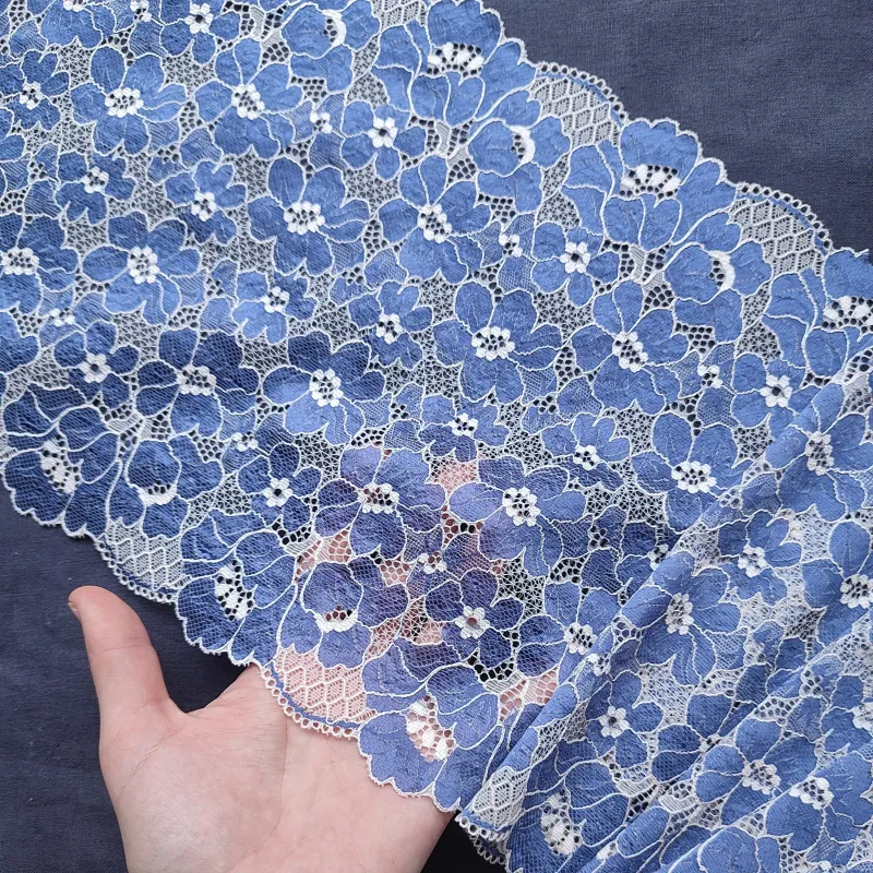 beige lace with blue floral pattern and scalloped edges