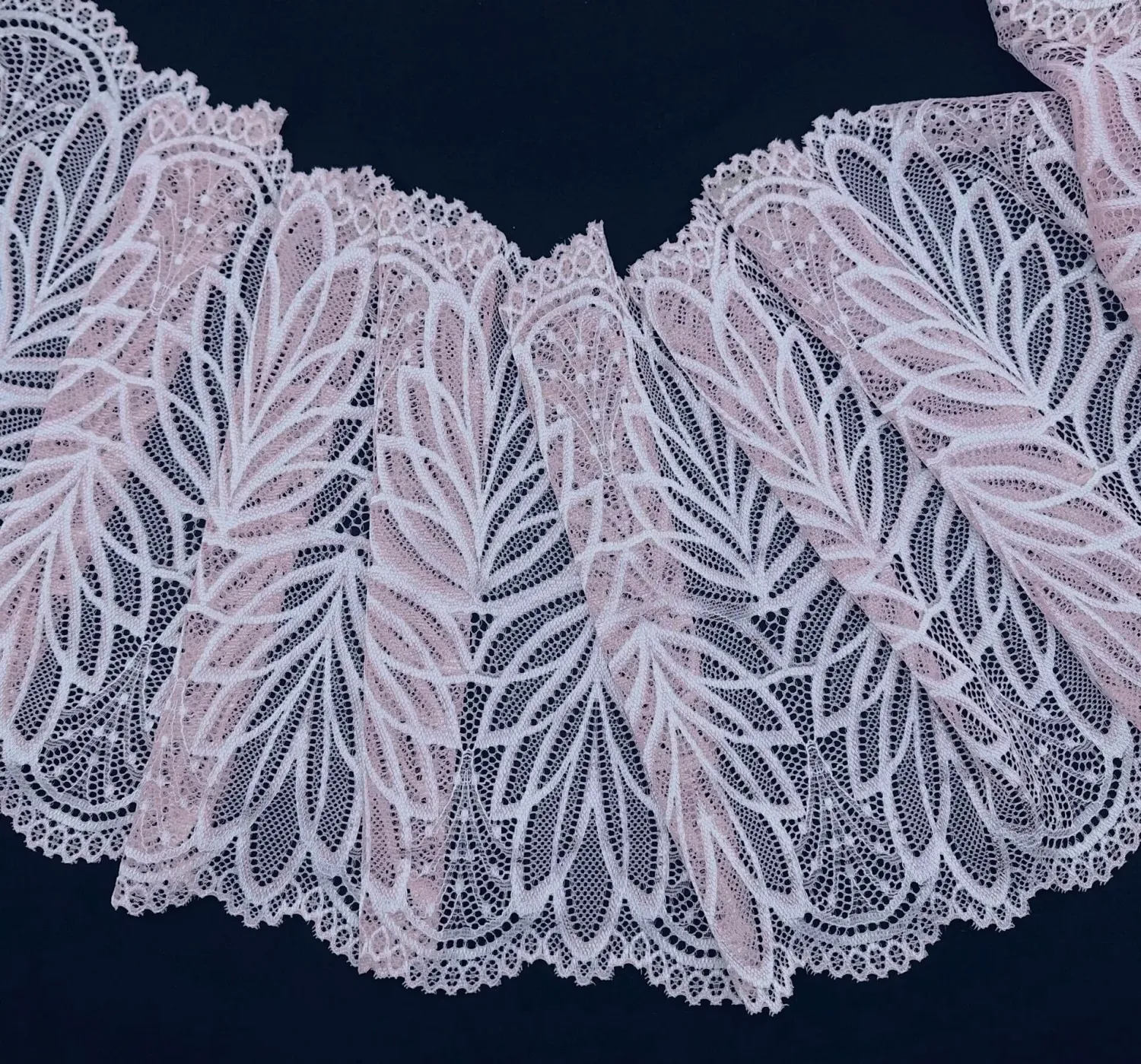 dusty rose stretch lace with floral pattern and scalloped edges