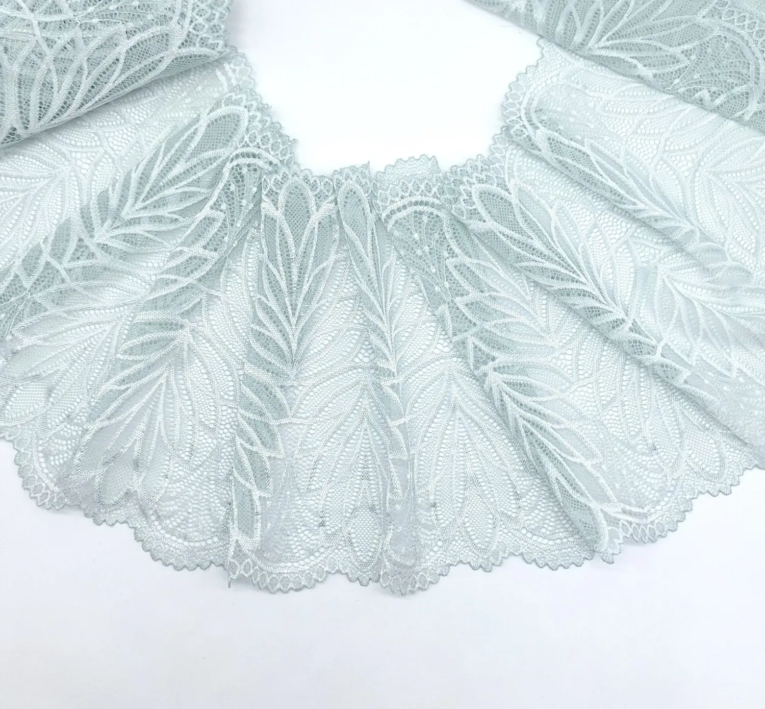 sage stretch lace with floral pattern and scalloped edges