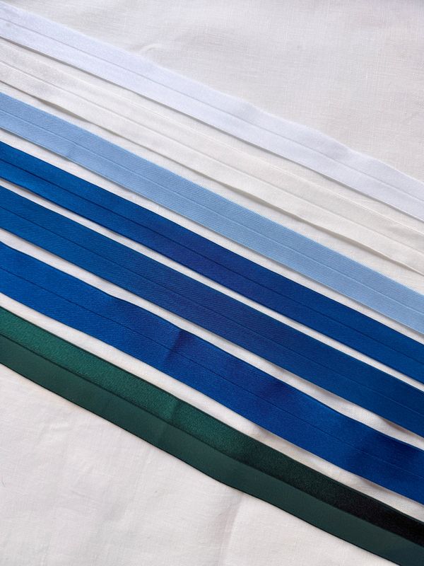 Satin fold over elastic fabric
