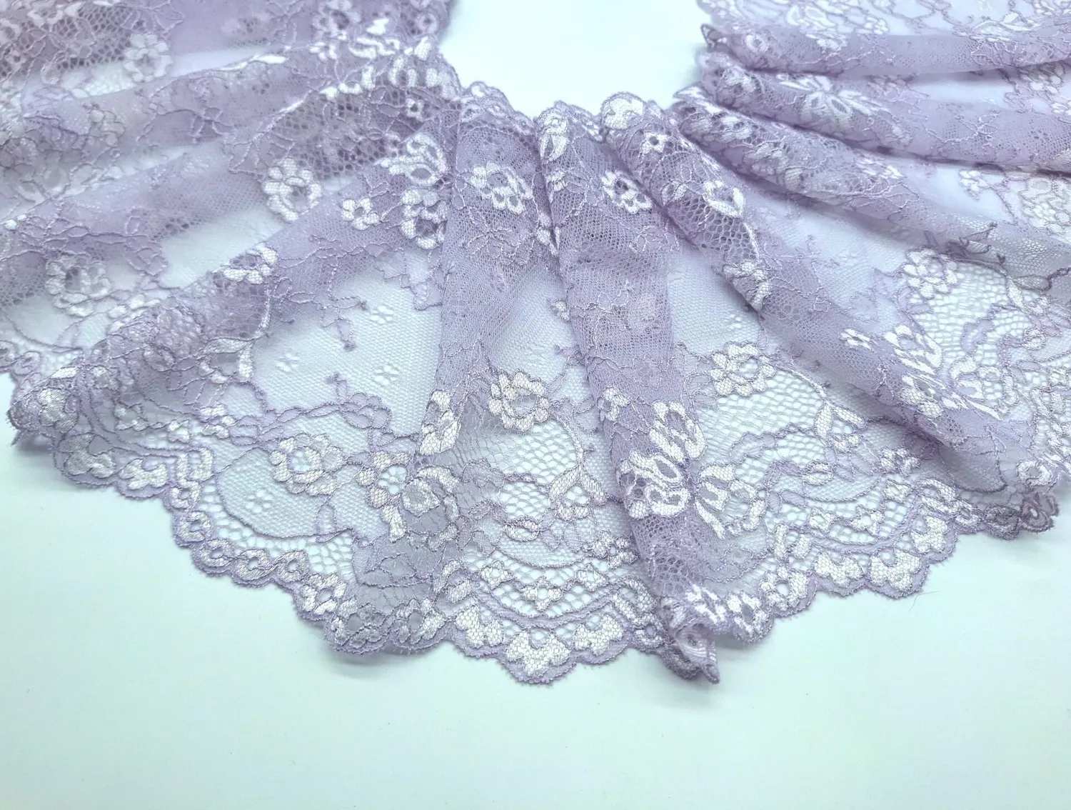 Orchid stretch lace fabric, 17cm wide scalloped trim