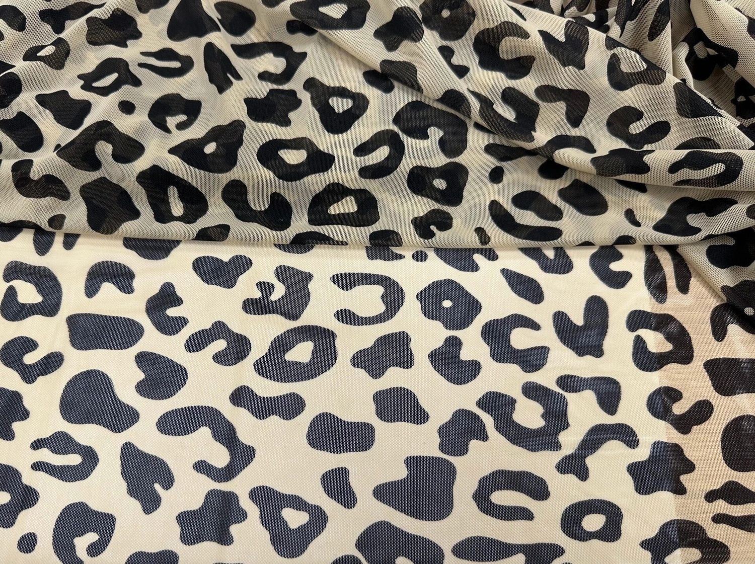 Printed elastic mesh snow leopard 1 meter