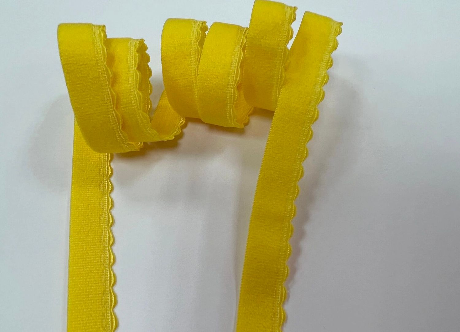 Decorative lingerie elastic yellow -12mm (50m)