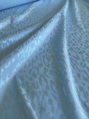 Blue Leo stretch satin fabric SoftDolly by Boselli with Pantone Ice Water colour reference