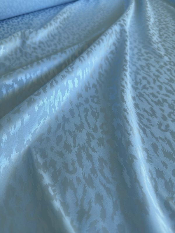 Blue Leo stretch satin fabric SoftDolly by Boselli with Pantone Ice Water colour reference