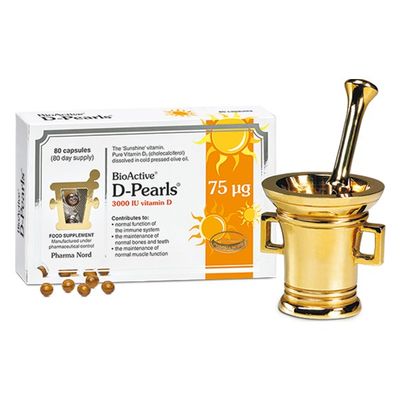 BioActive D-Pearls 75µg 80 Capsules Pharma Nord BioActive D-Pearls 75ug vitamin D3, 80 capsules box beside brass pestle and mortar