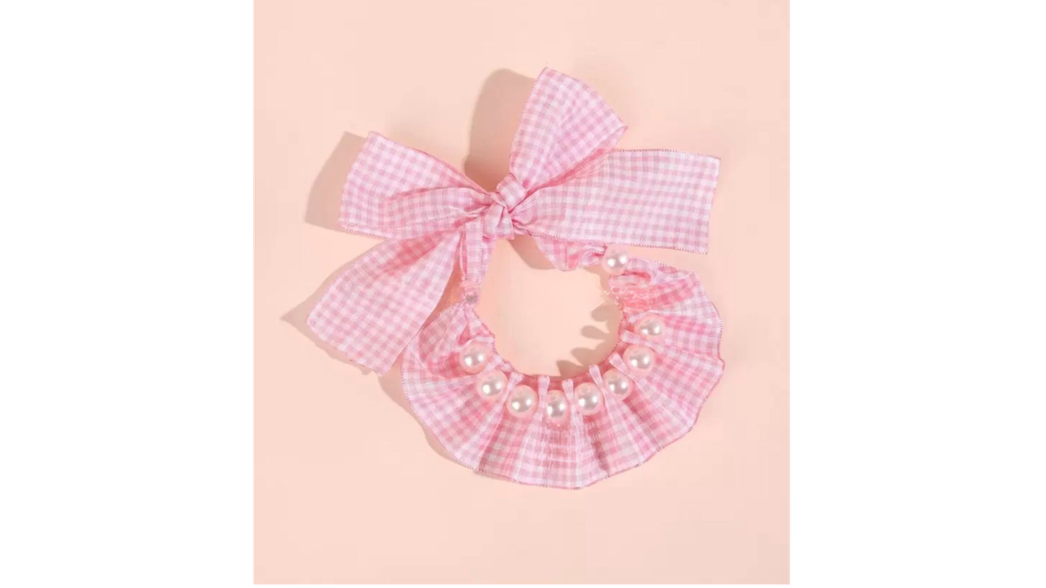 Pink bow dress with satin bodice (flat lay)