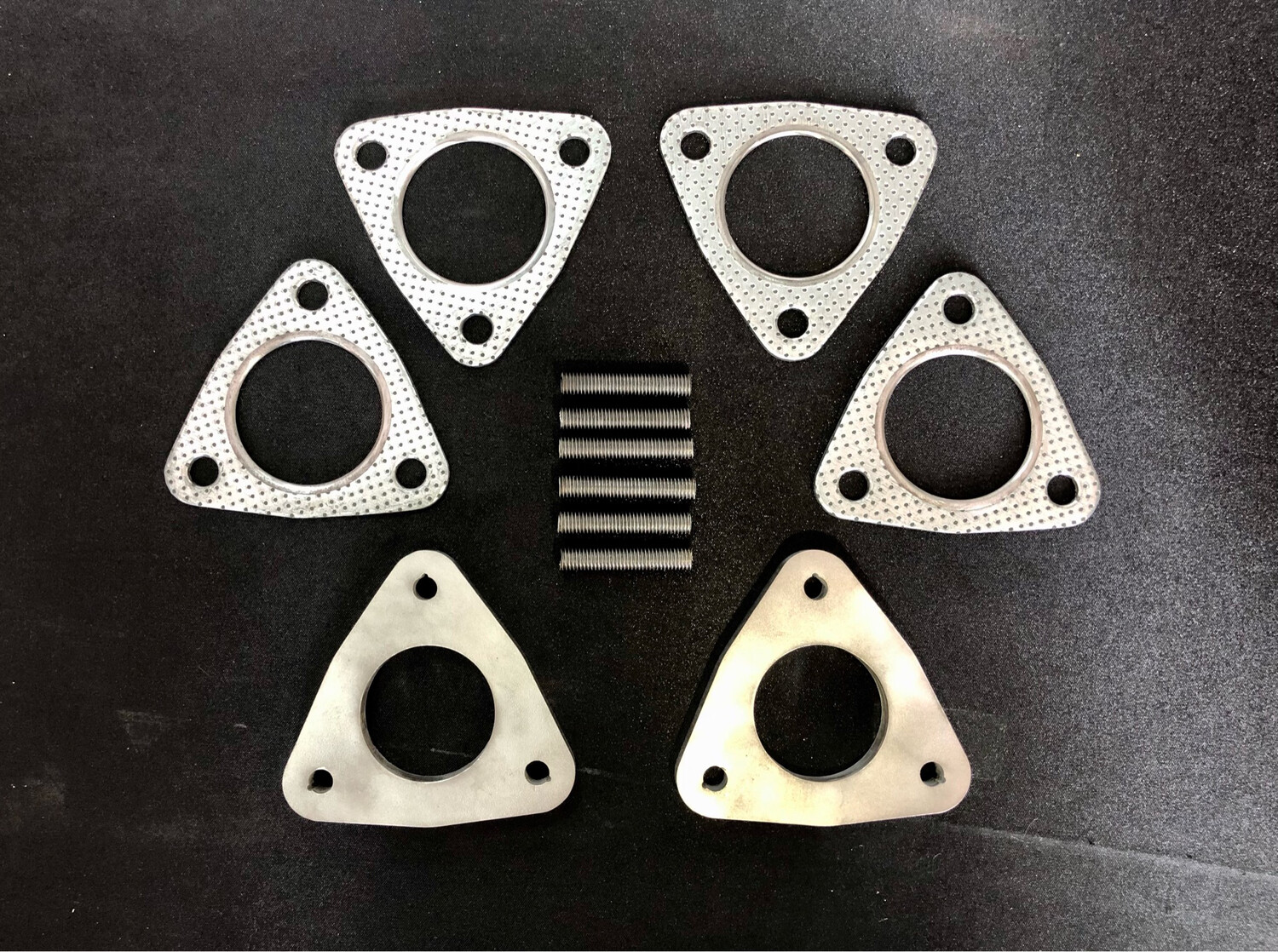 TWO OF 10MM THICK STAINLESS STEEL SPACERS FOR STROKER ENGINE. INCLUDE 2 EXTRA GASKETS