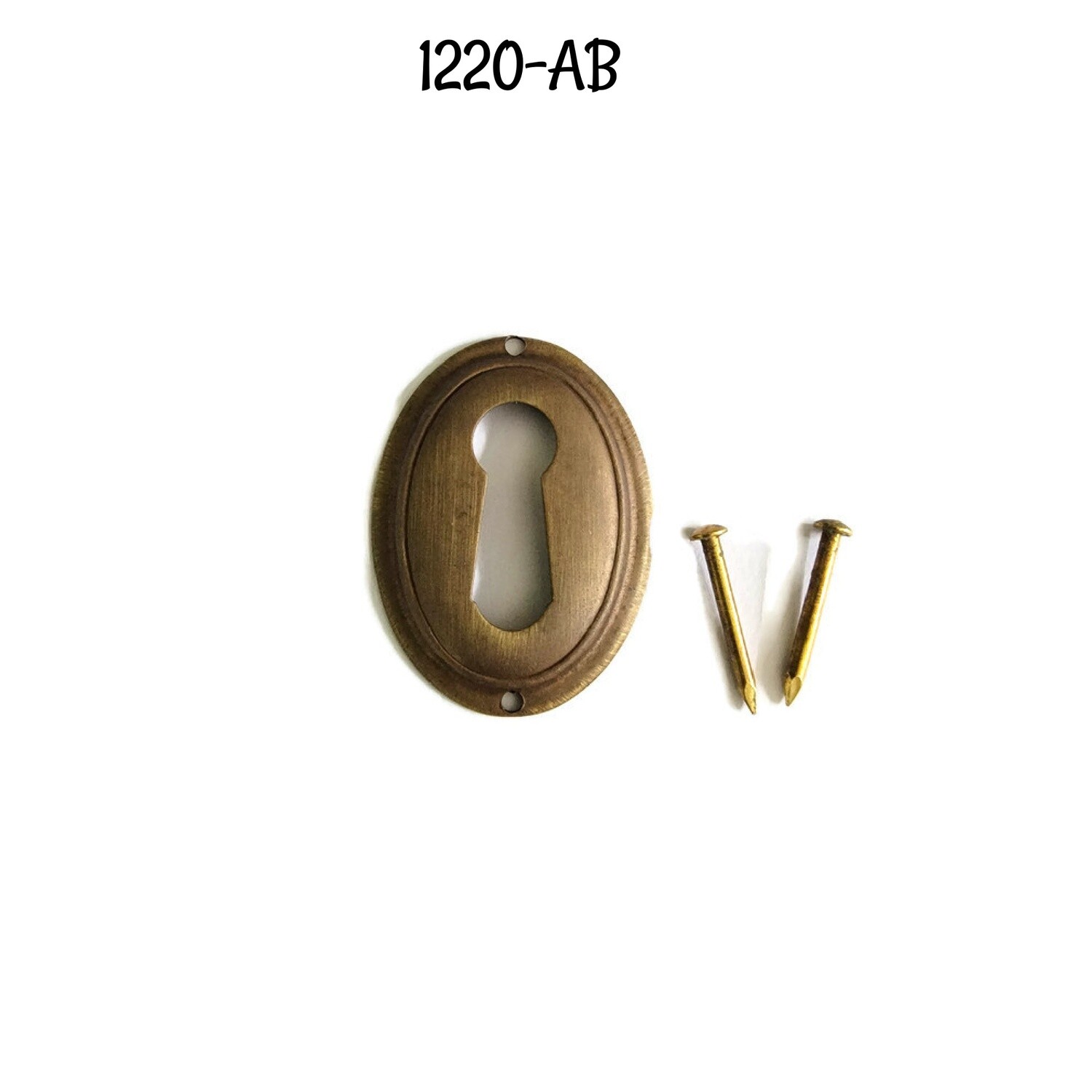 Hepplewhite/Sheraton style Oval Antiqued brass keyhole cover