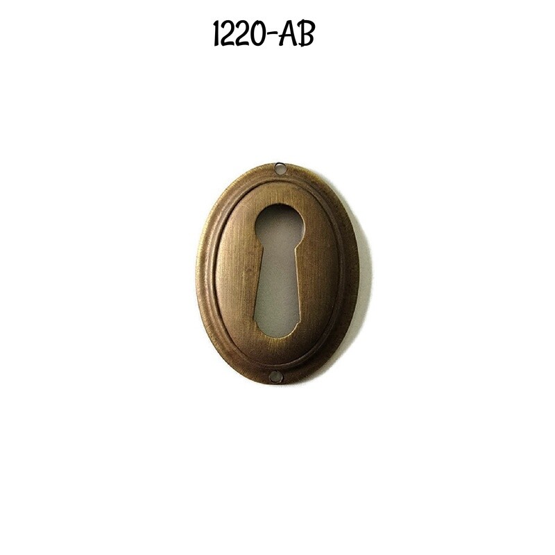 Hepplewhite/Sheraton style Oval Antiqued brass keyhole cover