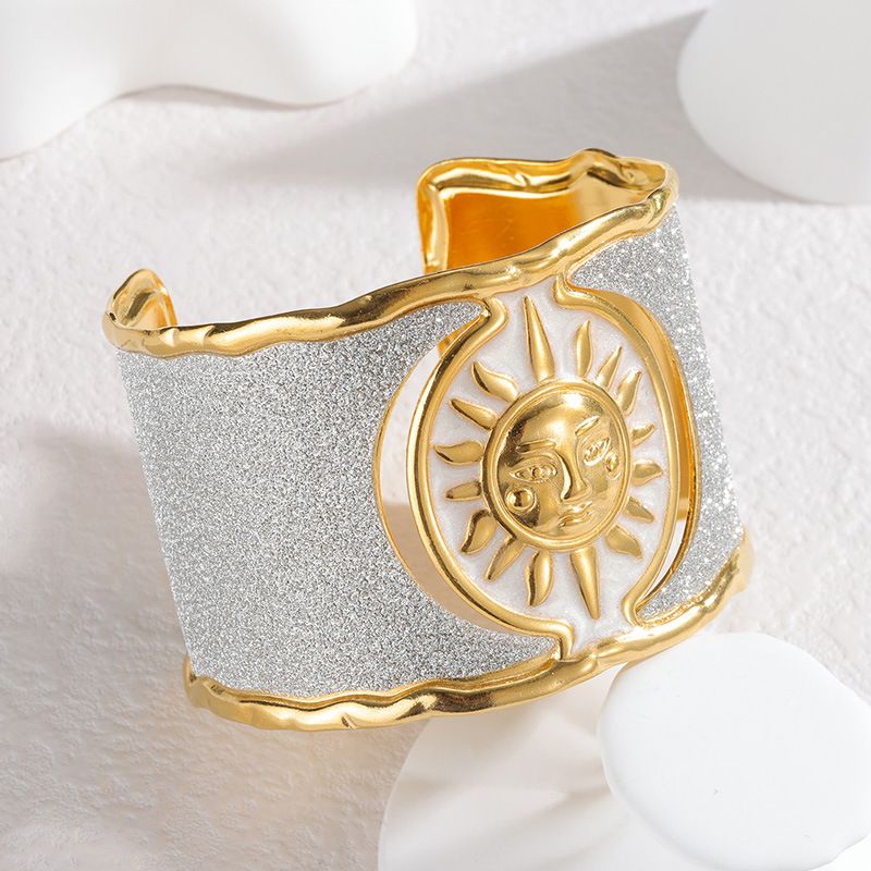 Brazalete inoxidable SOL acero inoxidable chapado en oro 18 k