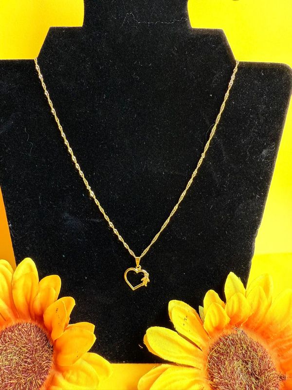 COLAR CORACAO MENINO BANHADO A OURO 18K.