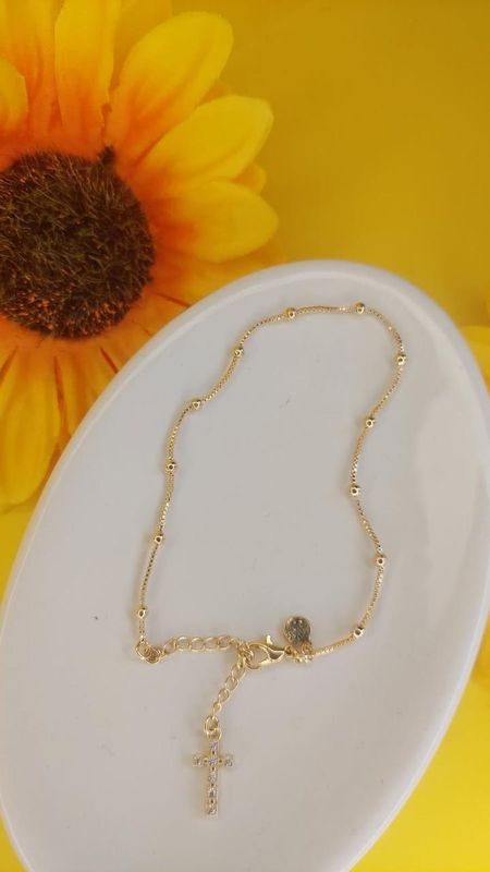 PULSEIRA PENDENTE CRISTO COM ZIRCONIA BANHADO A OURO 18K.