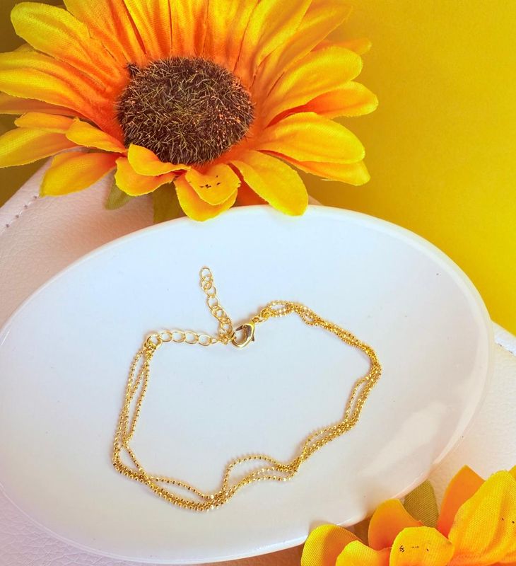 PULSEIRA TRIPLA MALHA BOLINHA LISA BANHADA A OURO 18