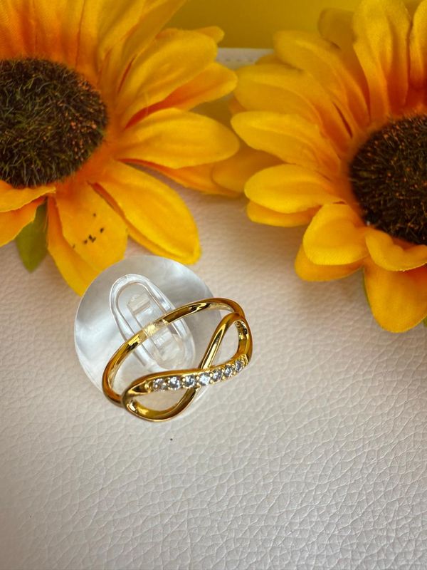 ANEL INFINITO COM ZIRCONIA BANHADO A OURO 18K