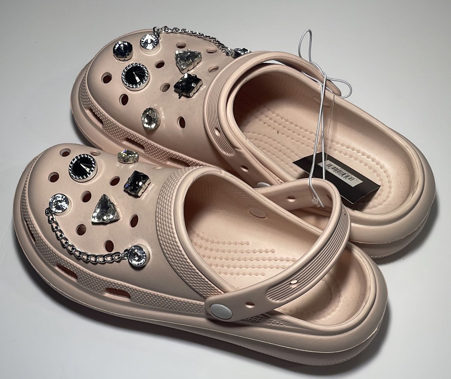 CROCS ONE IN WHITE, ONE IN PIN