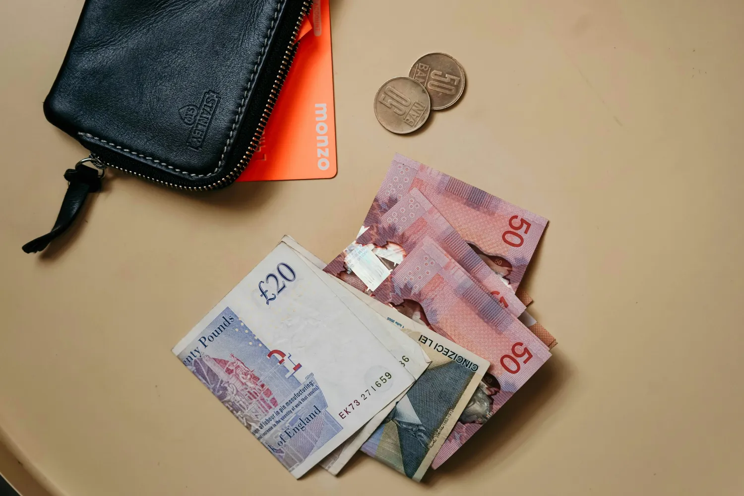 Wallet with money to show the Debtor and legal claim tracing service to locate a current and verified UK address