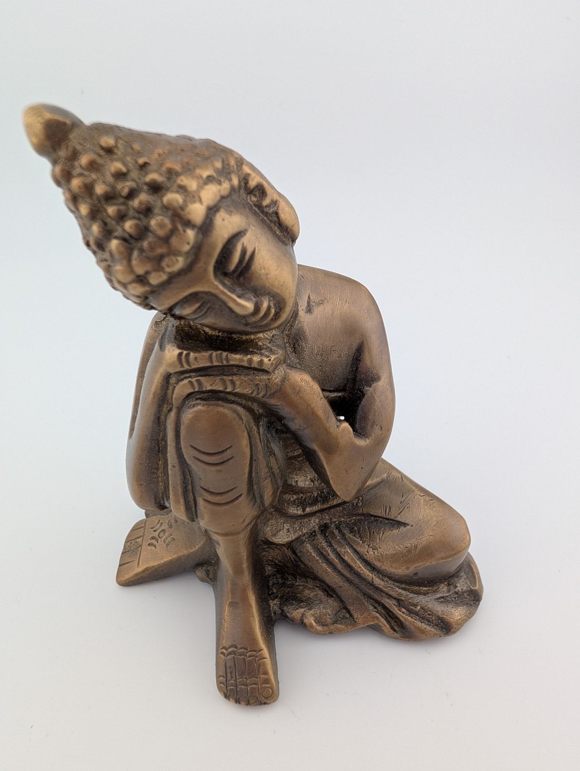 RESTING BUDDHA BRASS STATUE