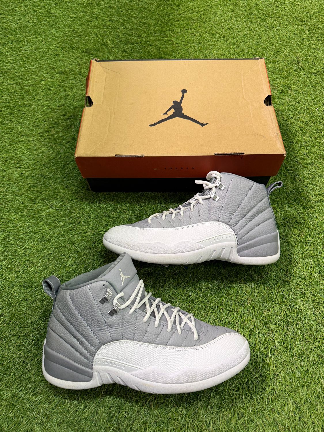 PREOWNED AIR JORDAN 12 &quot;STEALTH&quot; SIZE 10.5