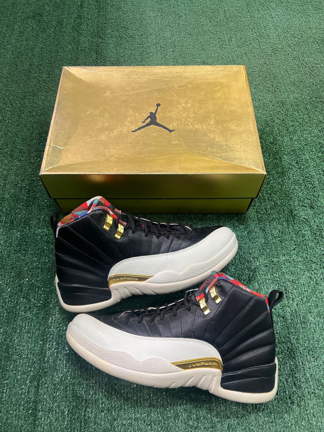 PREOWNED AIR JORDAN 12 &quot; CHINESE NEW YEAR&quot; SIZE 9.5