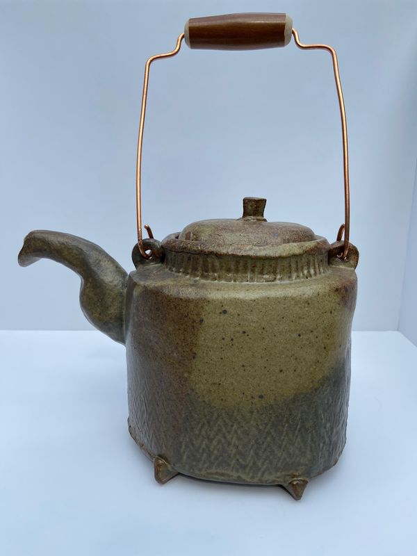 Teapot with copper handle