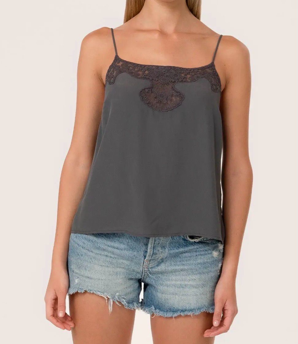 Woman wearing Lovestitch pewter grey embroidered lace camisole with adjustable straps.