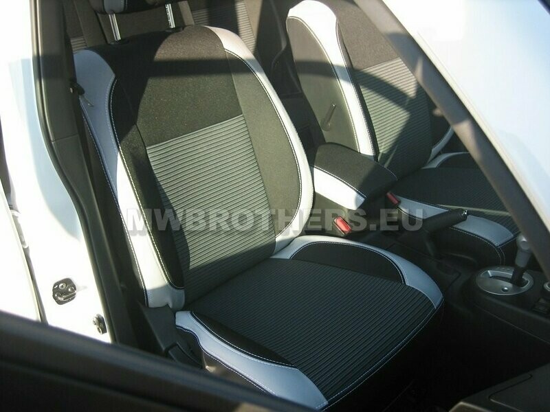 Comfort series with white leather and gray textile and white stitching