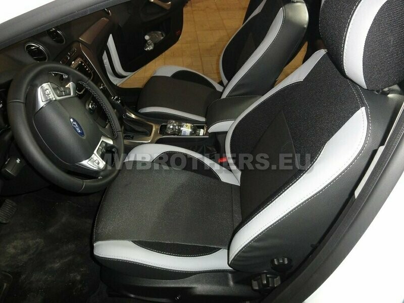 Comfort series with white stitching and black textile and white leather