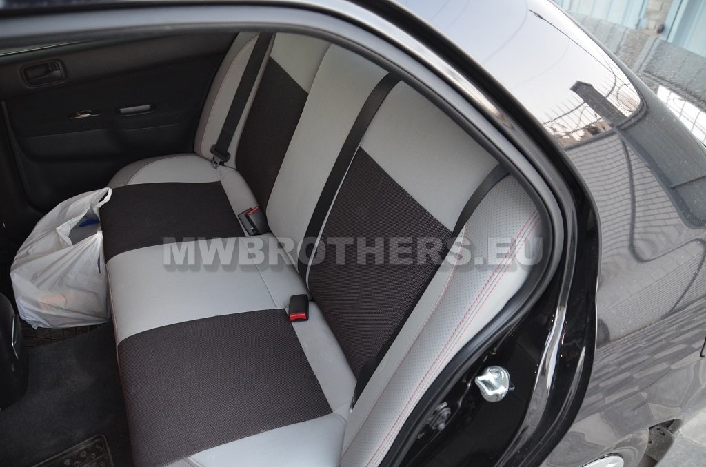 Comfort series with white leather and brown textile and red stitching