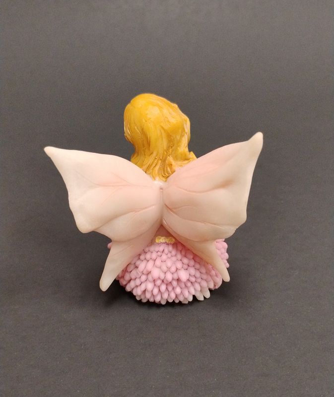 Mini Fairy On Flowers Statue