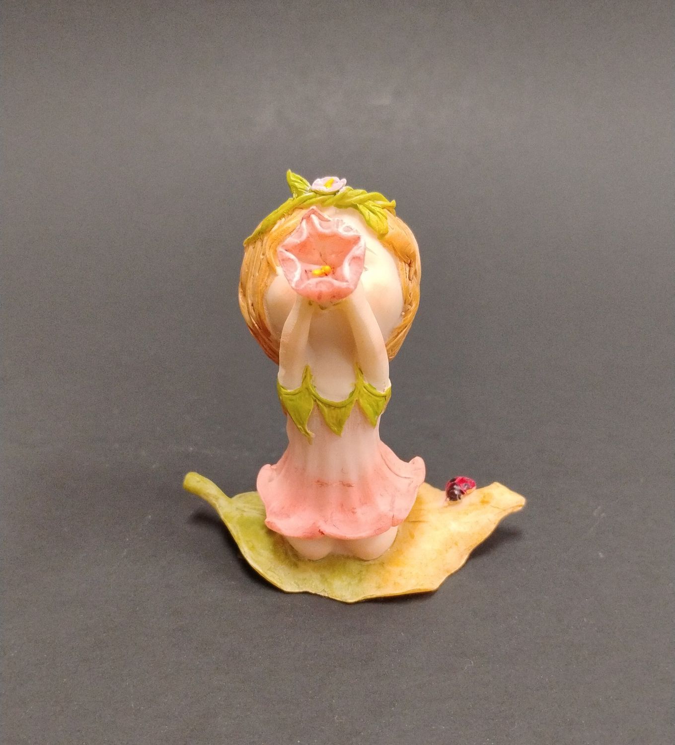 Little Fairy Blowing Flower Statue
