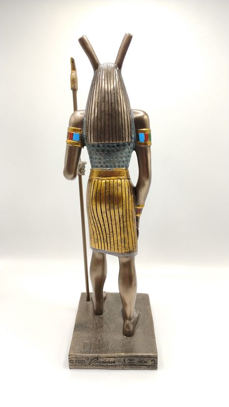 Seth Holding Staff Statue