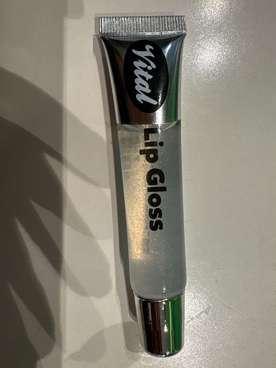 Vital lip Gloss clear glitter