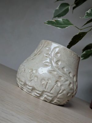 Sensory off white ceramic coffee cup