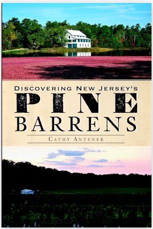 The cover of 'Discovering New Jersey's Pine Barrens' featuring a bog and a sunset and the author's name, Cathy Antener