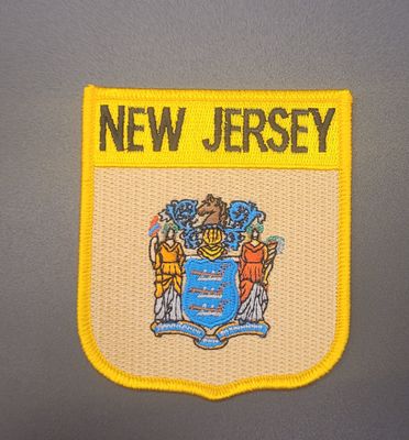 A yellow patch that says 'NEW JERSEY' across the top with the Great Seal embroidered below it.