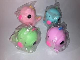 BALLE À PRESSER - DINO QUI TIRE LA LANGUE