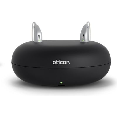 Oticon Charger 1.0 with compatible miniRITE R hearing aids inserted