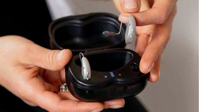 Starkey Omega AI rechargeable hearing aids with charger