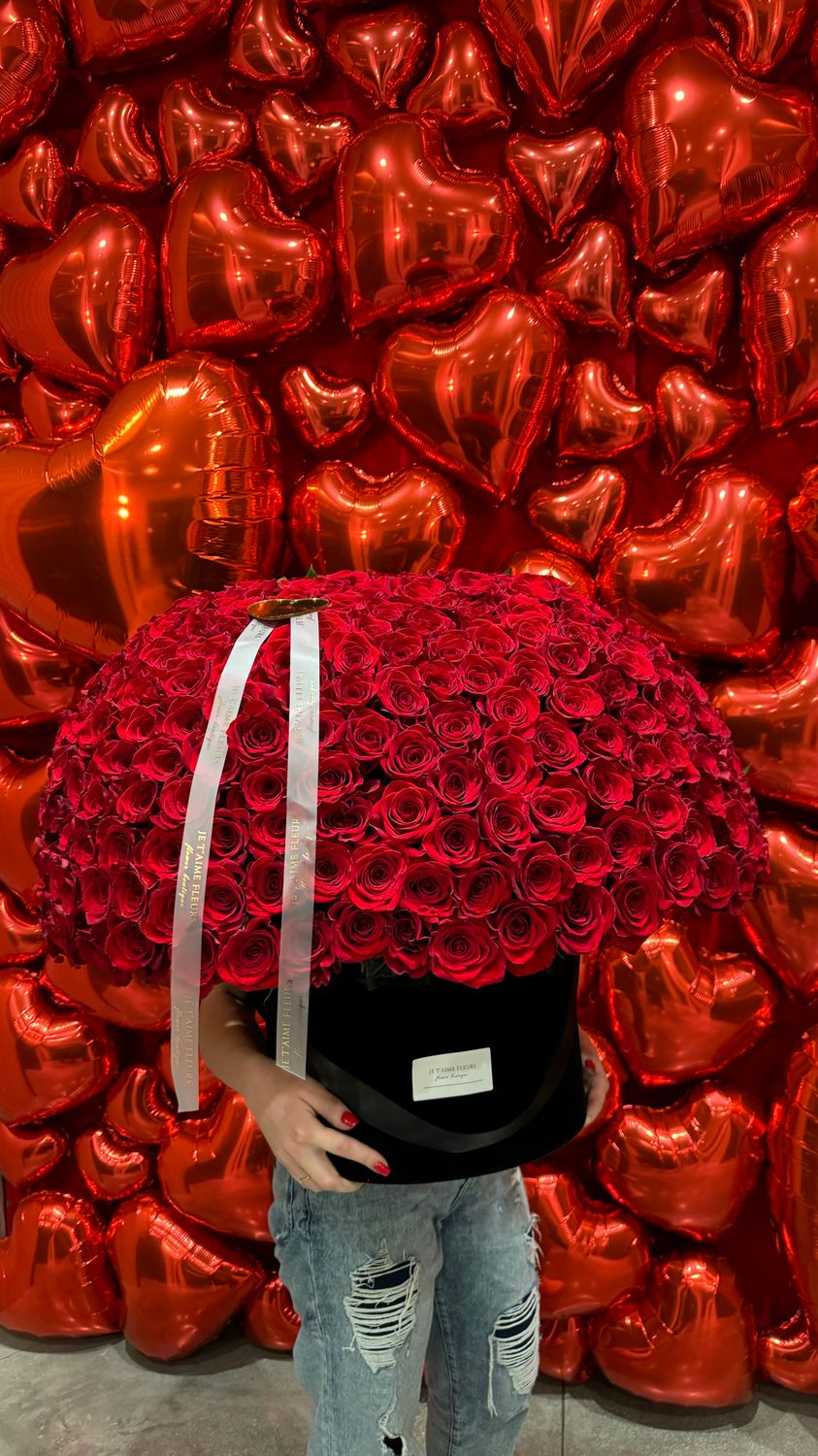 Luxury arrangement of 200 red roses in a signature round box, sculpted into a perfect dome
