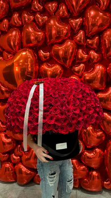 Luxury arrangement of 200 red roses in a signature round box, sculpted into a perfect dome
