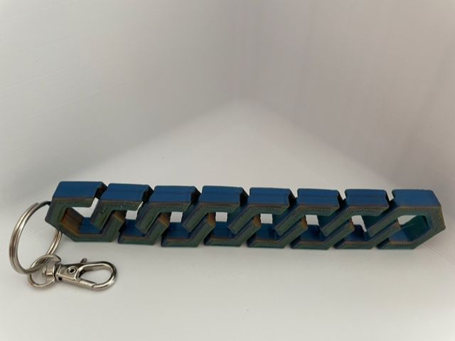 Hexagonal Articulated Flexi Anhänger