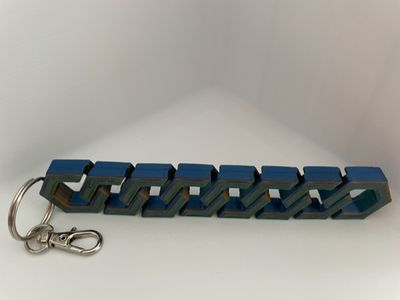 Hexagonal Articulated Flexi Anhänger