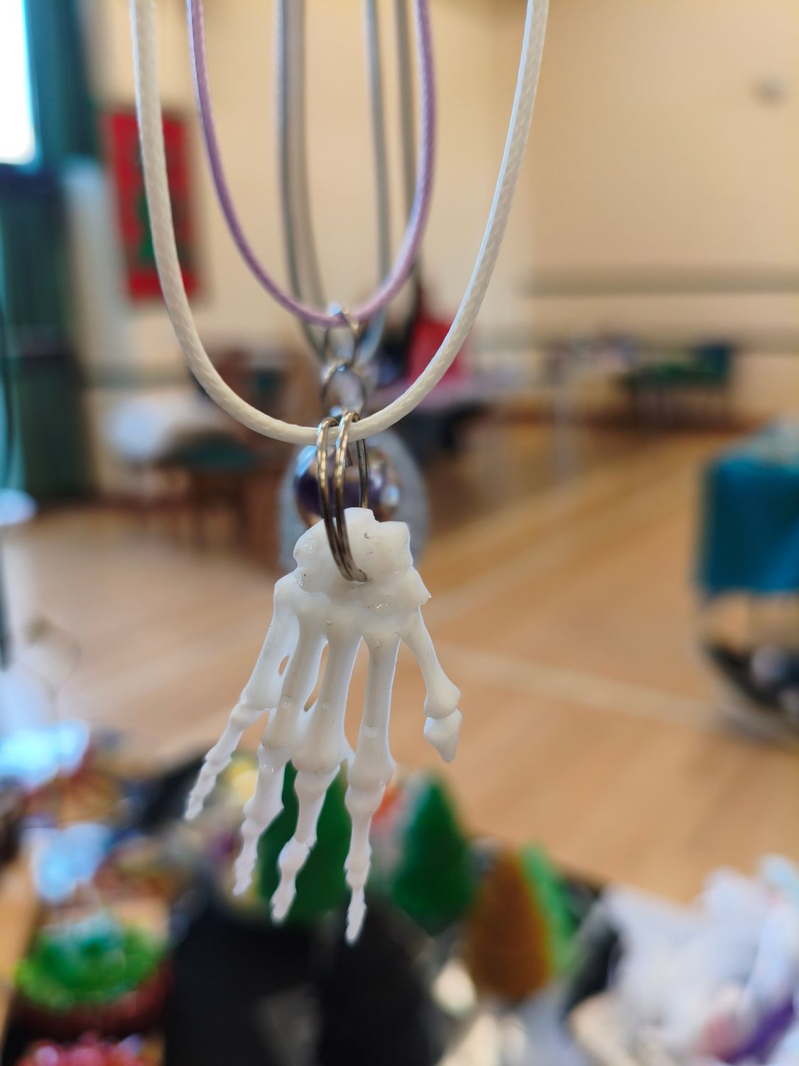 SKELETAL HAND PENDANT