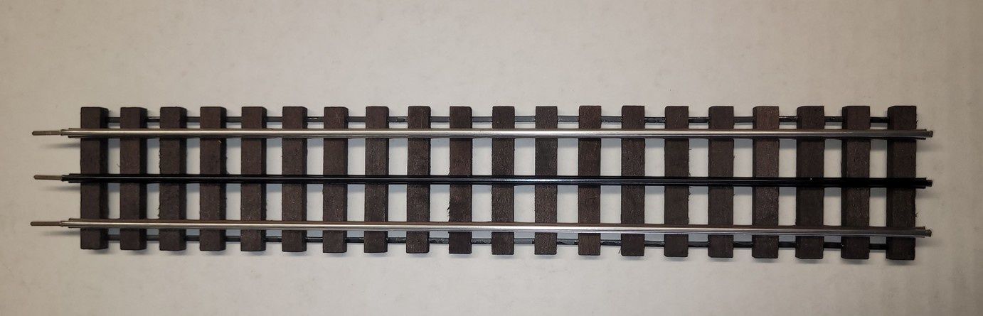 "Phantom line" rigid straight track