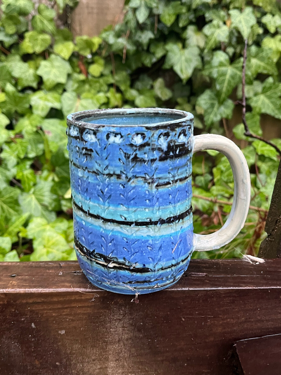 colored clay marble blue carved mug